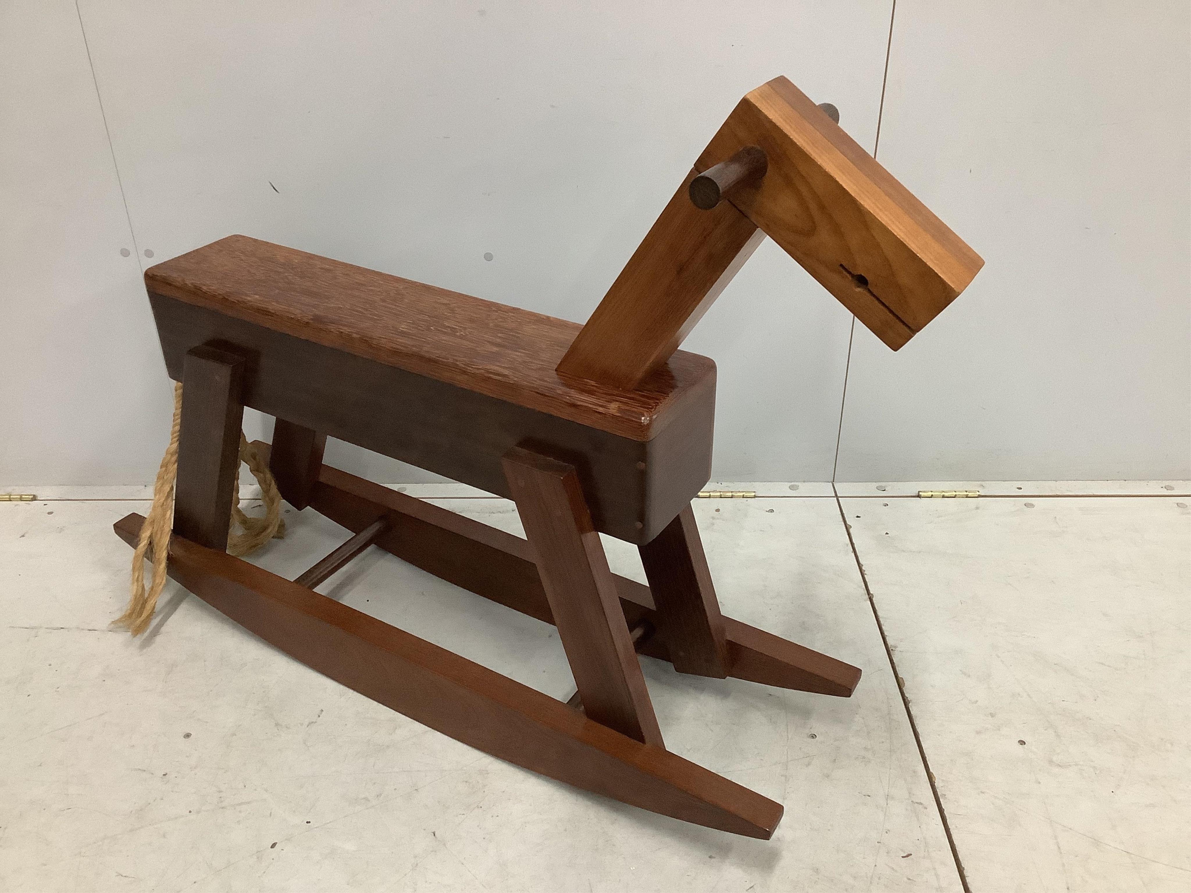 80-120A mid century design exotic hardwood rocking horse, length 114cm, height 88cm. Condition - good